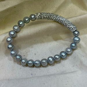 Fresh water pearls silver and white stones